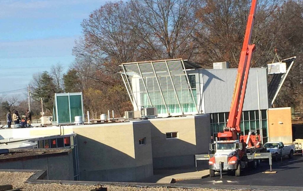 Crane Installing Commercial Unit